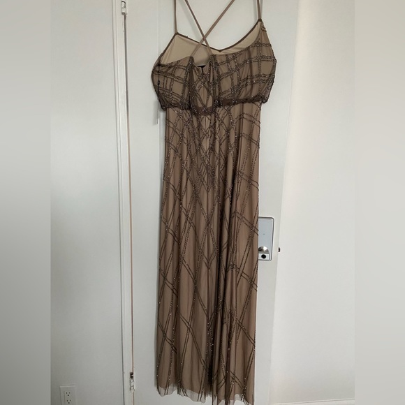 This brand new maxi dress is perfect for a special occasion. - Picture 11 of 13